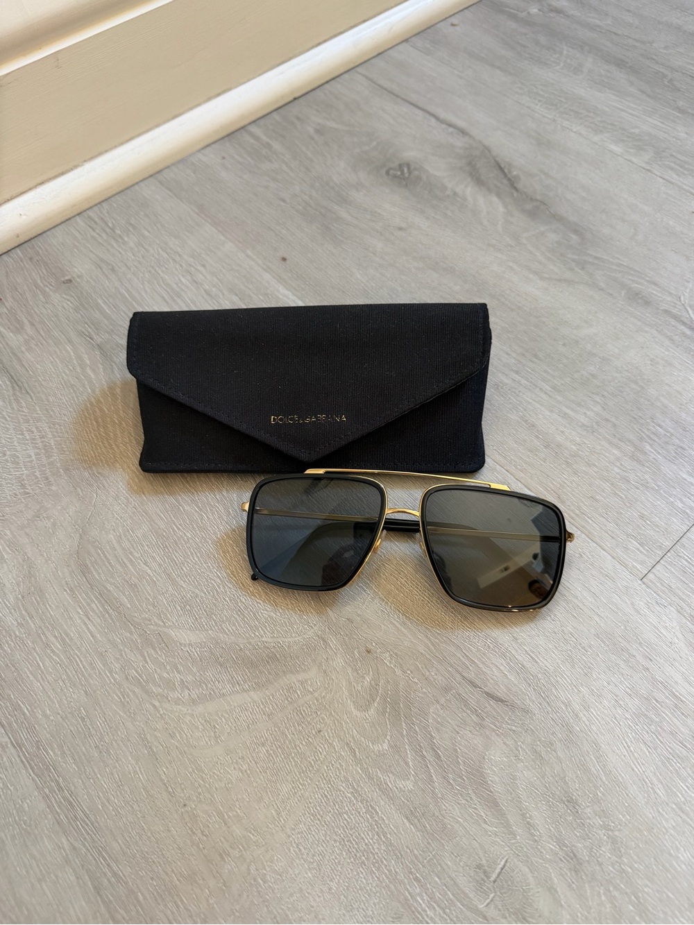 Dolce & Gabbana Black and Gold polarized Sunglasses with Case